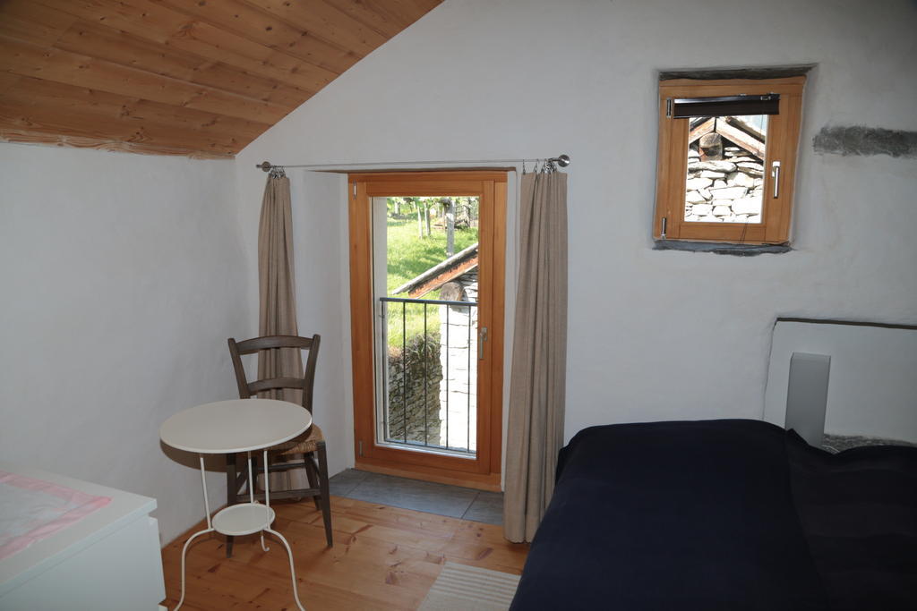 Ferienwohnung Casa Flora Verdabbio Zimmer foto